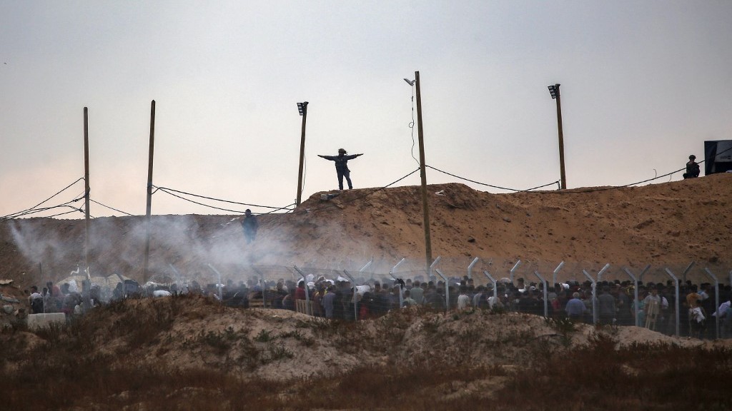 Gaza Aid Site Attack: Dozens Killed, Injured